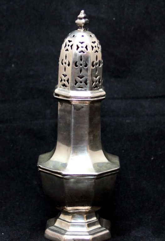 ES BARNSLEY & CO ENGLISH STERLING MUFFINEER, 1913: Edward Souter Barnsley & Company English sterling silver 2 ounce muffineer having octagonal form. Holds impressed maker's mark with Birmingham town marks. Dated 1913. Measures 6 5/8" height. Total wei
