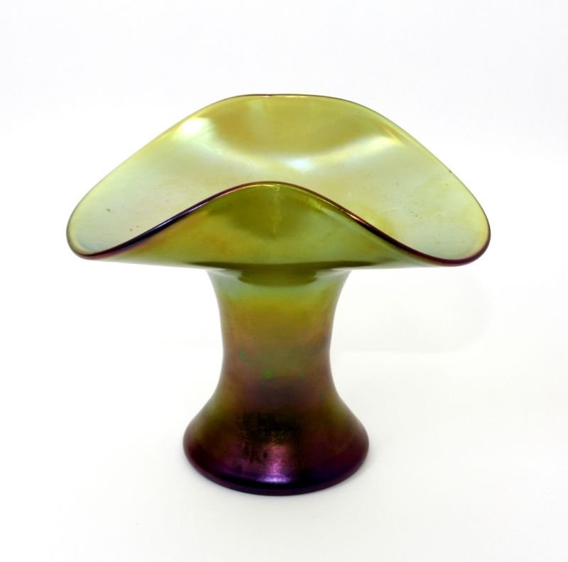 LOETZ IRIDESCENT SATIN FINISH VASE: A Loetz vase having a curled lip design. Measures 5 3/4\\\" Tall by 6 1/4\\\" Long by 4 1/2\\\" Wide.