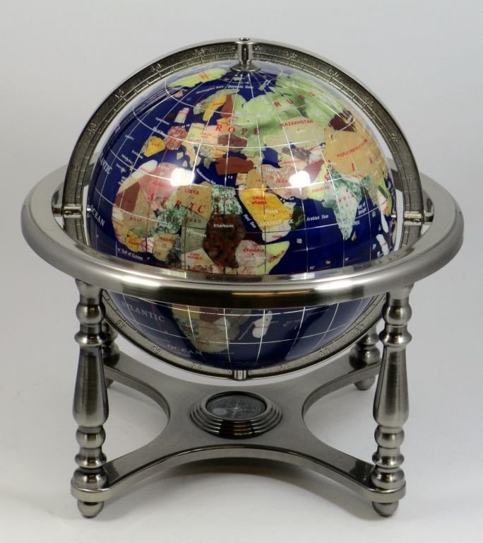 A STONE INLAY GLOBE IN METAL MOUNT w COMPASS: Compass Jewel 13-inch Gemstone Desktop World Globe by Replogle. This striking world globe depicts our Earths continents, countries and bodies of water with beautifully inlaid, hand carved semi preciou