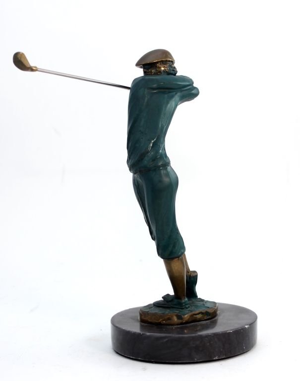TOM BENNETT COLD PAINTED BRONZE GOLFER FIGURE: Tom Bennett (AMERICAN, 1928 - ) cold painted bronze sculpture depicting a golfer finishing a swing with a driver club. Etched signature to side of bronze base, dated 1994. Mounted on round black marbl