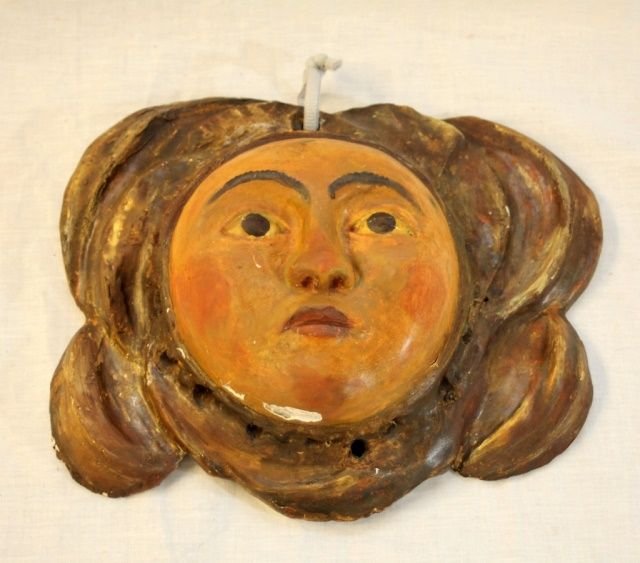 ANTIQUE EUROPEAN WOODEN PAINTED WALL MASK: Antique and unusual European hand carved and painted figural wall mask plaque. Brown and gold tones with peach tone face. 19th century. Probably French or Italian. Measures 9 1/2" height x 11" width.