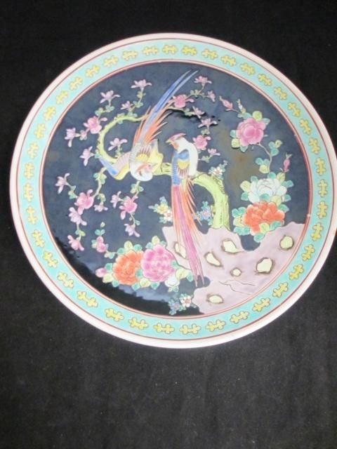 JAPANESE YAMATOKU MEIJI PERIOD PORCELAIN CHARGER: Antique Yamatoku Imari Japanese porcelain charger depicting paradise birds over black ground. Bottom holds four character katagana impressed marks with iron red floral mark. Bottom also holds center s