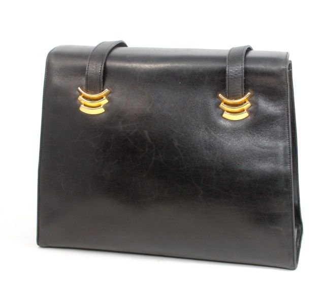 SALVATORE FERRAGAMO ITALIAN DESIGNER LEATHER PURSE: Salvatore Ferragamo Italian navy black leather genuine designer purse with overlapping latch design. Gold tone hardware. Black leather interior with one zippered pocket. Numbered 0212647 interior. Mea