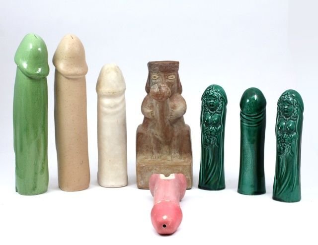LOT OF 9 CERAMIC PHALLIC ITEMS: A lot of 8 20th century ceramic and pottery phallus figure items. Tallest piece 9" height.