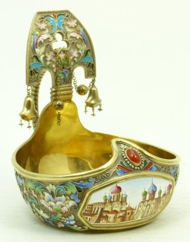 RUSSIAN IMPERIAL ENAMEL OVER SILVER HANDLED KOVSH: RUSSIAN IMPERIAL MULTI COLOR ENAMEL DESIGN OVER SILVER HANDLED KOVSH W/ JEWELS & MINITURE TOWARDS FRONT OF THE PIECE. HOLDS THE MARKS OF WORKMASTERS AND SILVER PURITY MARK. MEASURES 5" TALL. TOTAL WEI