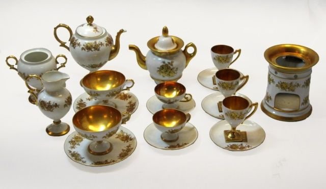 19pcs ANTIQUE LIMOGES 'CASA DI VENEZIA' TEA PIECES: A set of 19 antique Limoges French porcelain tea service items in the 'Casa di Venezia'. Has hand painted gilt floral design. Set includes three unusual square foot teacups with saucers, two demitasse