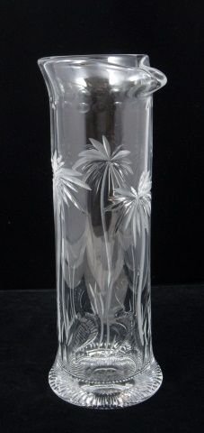 WILLIAM YEOWARD CRYSTAL MARTINI PITCHER: WILLIAM YEOWARD CRYSTAL MARTINI PITCHER WITH ENGRAVED PALM TREES THROUGHOUT. MEASURES 11" TALL BY 4" WIDE