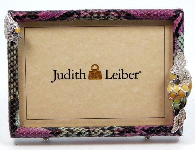 JUDITH LEIBER ENAMEL SNAKE SKIN PICTURE FRAME: JUDITH LEIBER ENAMEL SNAKE SKIN PICTURE FRAME W/ TWO ENAMEL & RHINESTONE PARROTS. MEASURES 5.5" TALL BY 7.5" WIDE.