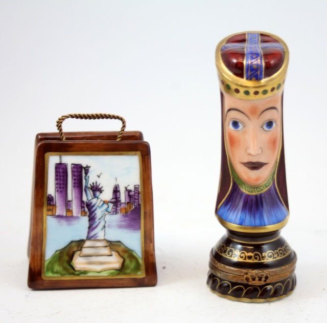 (2PCS) ATEUER DE LIMOGES HAND PAINTED BOXES: (2PCS) ATEUER DE LIMOGES HAND PAINTED PORCELAIN BOXES. 1) PRINCESS, 4" TALL BY 1.5" WIDE 2)BAG W/ NYC PAINTED ON, 2.75" TALL BY 2" WIDE.