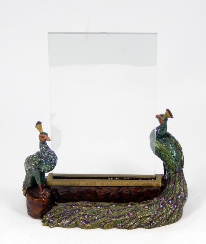 LARGE JAY STRONGWATER ENAMEL PEACOCK PICTURE FRAME: LARGE JAY STRONGWATER ENAMEL PEACOCK PICTURE FRAME. TWO STANDING PEACOCKS WITH LONG BACK FEATHERS WITH RHINESTONES THROUGH OUT. MEASURES 4' TALL BY 6" INCHES, TOTAL WEIGHT 1532.9g
