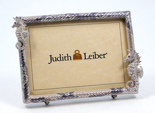 JUDITH LEIBER SNAKE SKIN PICTURE FRAME: JUDITH LEIBER LEATHER SNAKE SKIN FRAME W/ RHINESTONE SEA HORSES. MEASURES 5.5" TALL BY 7.5" WIDE.