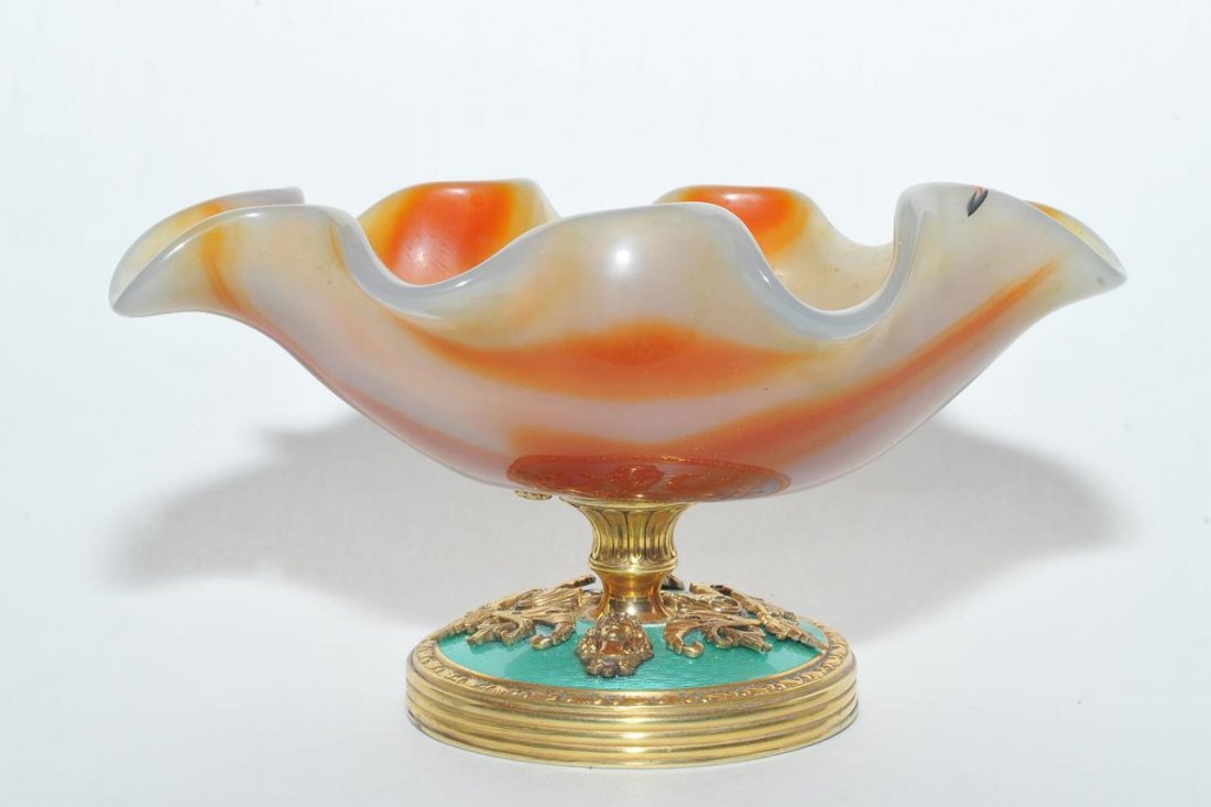 RUSSIAN GUILLOCHE ENAMEL SILVER CARNELIAN DISH: Russian guilloche enameled silver and carved carnelian agate shell form compote. Holds impressed 88 silver purity, town and workmaster marks. Measures approx. 4" height x 5 1/2" length x 4" depth.