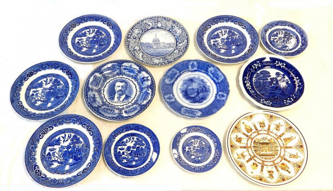 LOT OF 11 ENGLISH PORCELAIN FLOW BLUE PLATES +1: A lot of 11 English porcelain flow blue plate items plus an Wedgwood Shakespeare plate (12 plates total). Includes; 5 Willow plates (1 smaller) in the Blue Willow pattern, 1 Spode 'Spode's Tower' plat