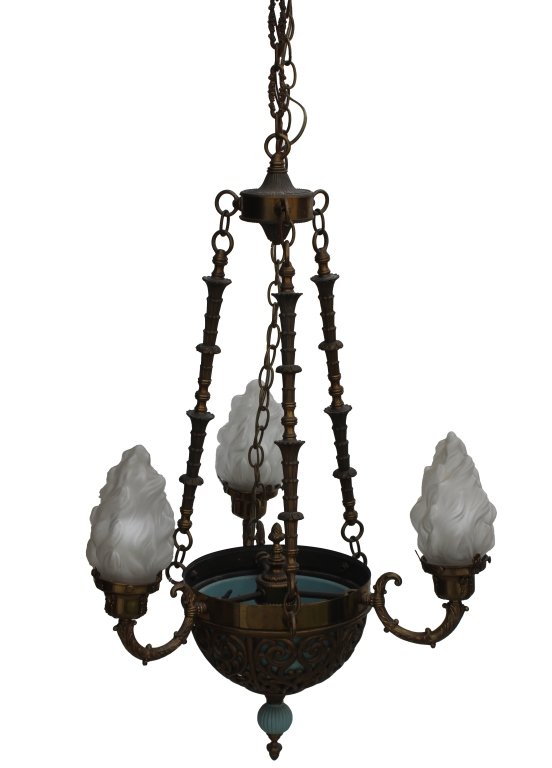 A BRASS & CRYSTAL THREE ARM CHANDELIER: A vintage brass chandelier having a 'Sevres blue' interior inlay design and ball to bottom. Three arms having figural flame frosted crystal light shades. Circa second quarter of the 20th century. Meas