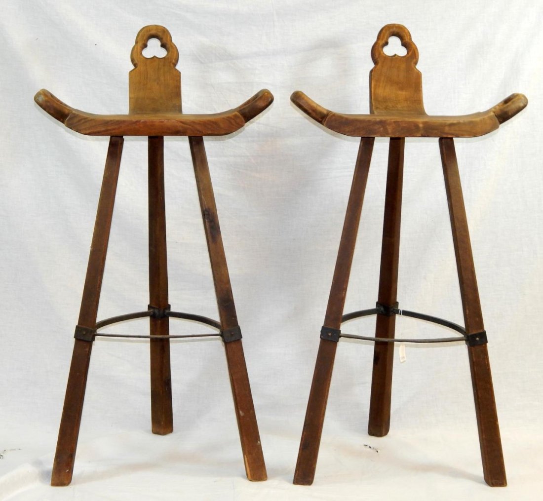 PAIR ANTIQUE BIRTHING BARSTOOL CHAIRS: PAIR ANTIQUE BIRTHING BARSTOOL CHAIRS. THESE WERE ORIGINALY TRADITIONAL ANTIQUE BIRTHING CHAIRS THAT WERE CONVERTED INTO BARSTOOLS.VERY UNIQUE AND THE ITEM HAS A RUSTIC WROUGHT IRON BRACKET THAT ACTS 