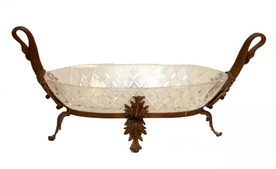 ANTIQUE EUROPEAN BRONZE & CRYSTAL SWAN CENTERPIECE: Antique figural swan oval centerpiece bowl crafted of bronze frame with cut crystal bowl. 19th century. Measures approx. 12" height x 25" length x 11" width.