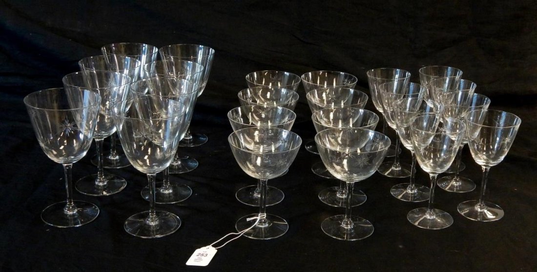 24 TIFFANY STUDIO CUT GLASS 'STAR' STEMWARE PIECES: A Group of Etched Glass Stemware, comprising of 8 wine glasses, eight cordials and eight champagne flutes. Tallest measures approx. 6 3/8" height.