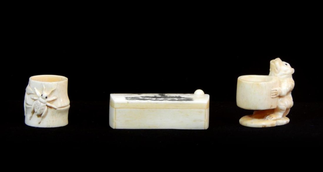3 CARVED BONE ITEMS, BOX AND CHINESE SALT CELLARS: A lot of three carved and scrimshawed bone items including a rectangular box depicting ship and globe and two Chinese carved salt cellars; one of bear, the other having grass hopper and frog with bamb