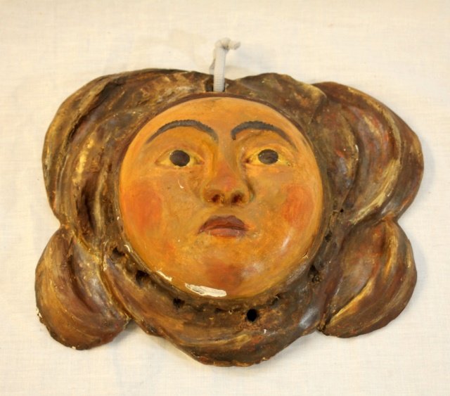 ANTIQUE EUROPEAN WOODEN PAINTED WALL MASK: Antique and unusual European hand carved and painted figural wall mask plaque. Brown and gold tones with peach tone face. 19th century. Probably French or Italian. Measures 9 1/2" height x 11" width.