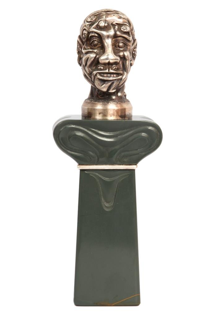 IMPORTANT JAPANESE PUZZLE BUST SCULPTURE: IMPORTANT JAPANESE SIGNED PUZZLE BUST SCULPTURE. STERLING SILVER BUST ON A BEAUTIFUL JASPER PEDISTAL BASE. DETAILED WOMEN FIGURES MAKE UP THE FACE. MEASURES: HEIGHT 20 CM.