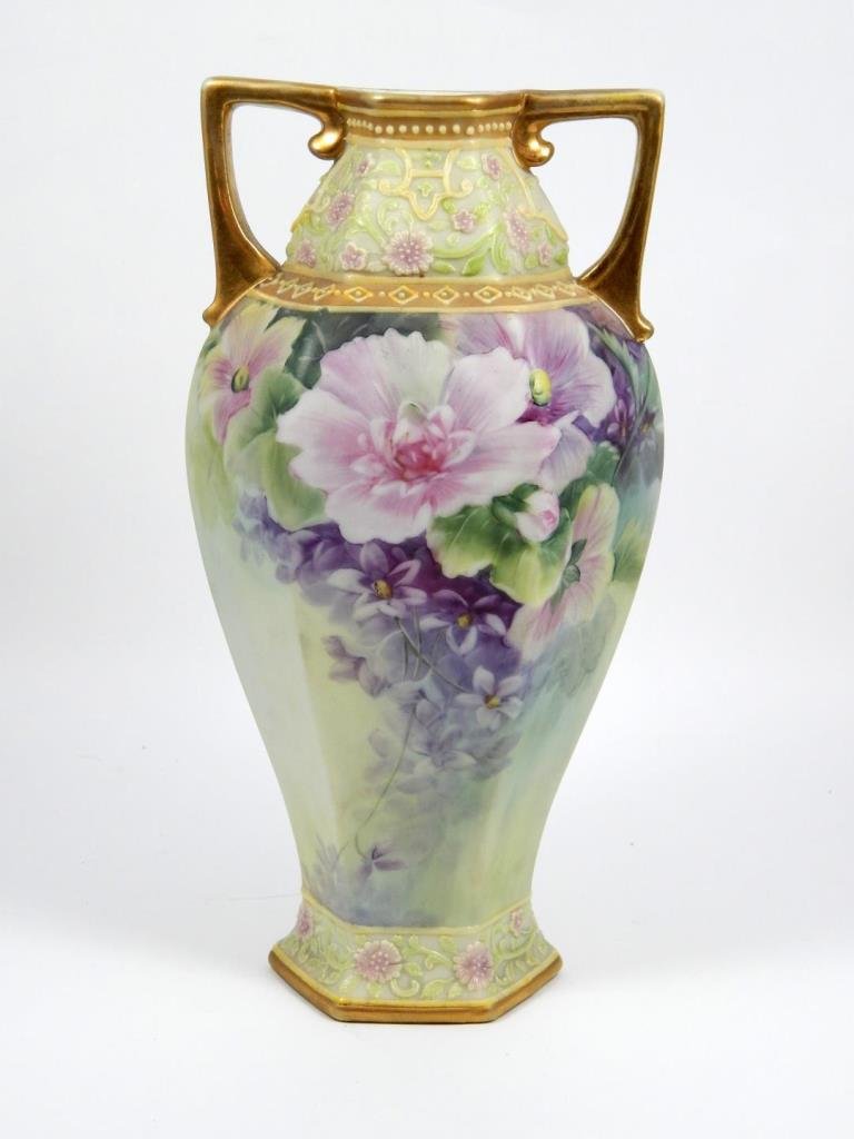 VINTAGE NIPPON HAND PAINTED PORCELAIN VASE: VINTAGE NIPPON HAND PAINTED PORCELAIN VASE DEPICTING A BEAUTIFUL FLORAL SCENE. MEASURES 10 3/4" HIGH BY 5 1/2" WIDE. TOTAL WEIGHT: 820g