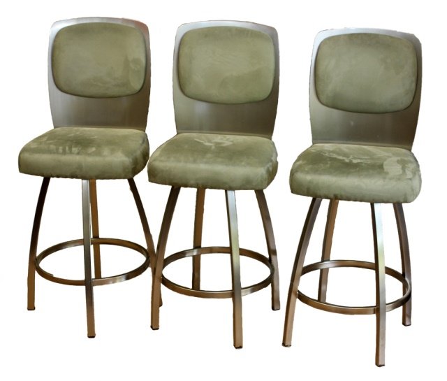 A SET OF 3 TRICA CALVIN SUEDE & METAL BAR STOOLS: A set of three Trica Calvin barstools having a suede and metal design. Chairs retail around $630.00 each. Chairs measure 32 3/4" height x 18" width x 19" depth.