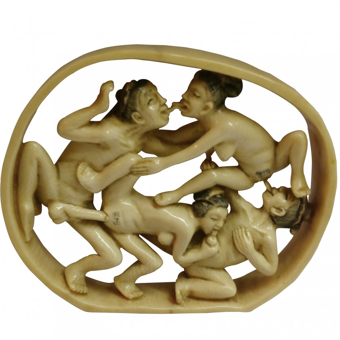 Rare Mammoth Ivory Erotic Netsuke - Foursome In a Circl: An outstanding very rare Mammoth Ivory Erotic Netsuke of a Foursome in a circle The Carved Ivory Shunga Netsuke is made of high quality, 100% genuine Mammoth Ivory Tusk. From the study conducted on Wo