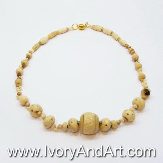 Mammoth Ivory Jewelry - Necklace with Elliptic balls: Beautiful & gentle mammoth Ivory Jewelry - Necklace with Elliptic balls. This hand made Mammoth Ivory Jewelry was hand made by top artist. The Mammoth ivory Beads are made out from 100% genuine Ma