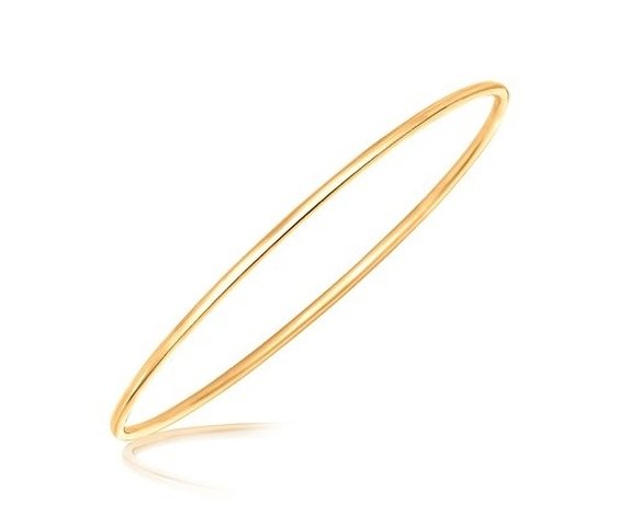 STERLING YELLOW HUE PLATED THIN BANGLE: .925 Sterling Silver Yellow Hue Plated Thin Bangle - The Perfect Accessory For A Simple But Powerful Style; This Thin Slip On Bangle Features Yellow Tone Plating - Designed In .925 Sterling Silver -