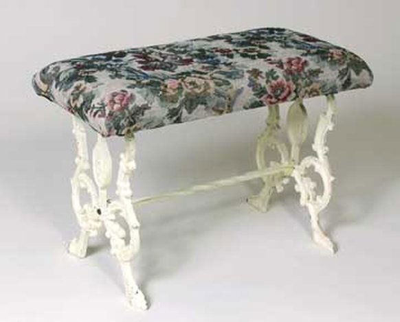 CAST IRON BENCH: CAST IRON BENCH - ANTIQUE WHITE FINISH - APPX 16"H X 24"W X 12"D - FABRIC MAY VARY - CAN BE EASILY RECOVERED