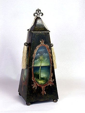 PAINTED METAL OBELISK BOX: PAINTED METAL OBELISK BOX WITH TASSELS.