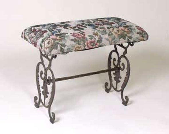 CAST IRON BENCH: CAST IRON BENCH - ANTIQUE BRONZE FINISH - APPX 18"H X 23"W X 11"D - FABRIC MAY VARY - CAN BE EASILY RECOVERED