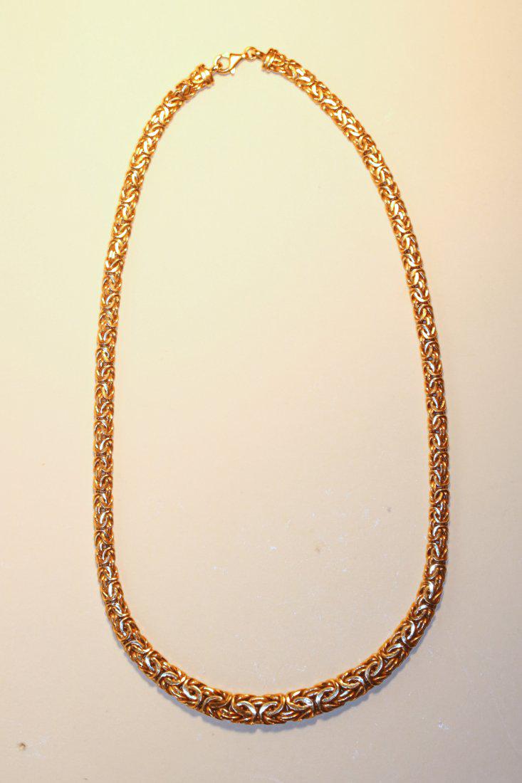 14K Yellow Gold Byzantine Chain: Byzantine yellow gold chain stamped 585kt, trademark Turkey. Measurements 5.72mm to 8.84mm wide and 19.5â€ long ending with a lobster clasp. Condition good. TW of Chain: 22.21gm TW and sizes are Ap