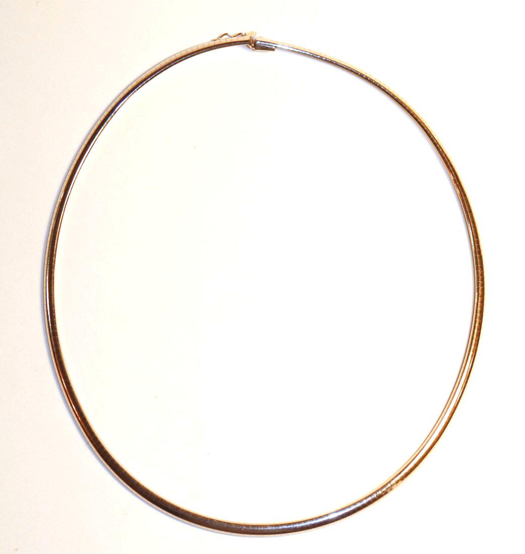14K White Gold Omega Chain: 14k white gold omega chain with high polish finish. 4mm wide and 18â€ long with insert clasp and figure eight safety. Trademark, Italy, condition is good. TW of Chain: 27.91gm TW and sizes are Appr