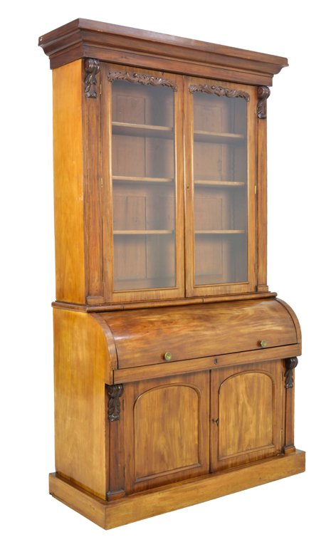 AN ANTIQUE MAHOGANY CYLINDER SECRETARY DISPLAY CABINET: AN ANTIQUE MAHOGANY CYLINDER SECRETARY DISPLAY CABINET 19th Century, Italy An antique mahogany display secretary is crowned by an inverted stepped cornice, rests on two glazed doors displaying a three