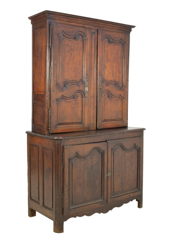 A PROVENCAL LOUIS XV STYLE OAK TWO PART CUPBOARD SIDEBO: A PROVENCAL LOUIS XV STYLE OAK TWO PART CUPBOARD SIDEBOARD AND CABINET Late 19th Century, Italy An antique Louis XV style oak cupboard is crowned by an inverted stepped cornice, with two panel doors w