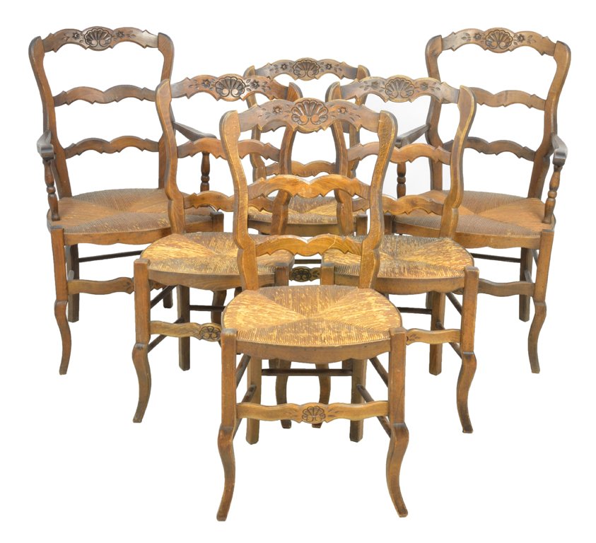 A SET OF 6 PROVENCAL STYLE OAK DINING CHAIRS: A SET OF 6 PROVENCAL STYLE OAK DINING CHAIRS Mid-20th Century Each shaped ladder back oak chair features a shell motif at the crest and woven rush seat supported by cabriole legs joined by shaped fron