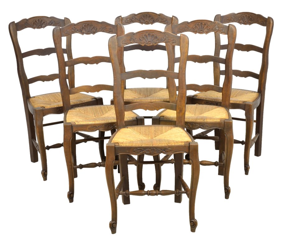 A SET OF SIX LOUIS XV STYLE PROVENCAL CHAIRS WITH RUSH : A SET OF SIX LOUIS XV STYLE PROVENCAL CHAIRS WITH RUSH SEATS Early 20th Century, France A set of six Louis XV style ladder back side chairs features a carved shell crest rail with shaped ladder back, 