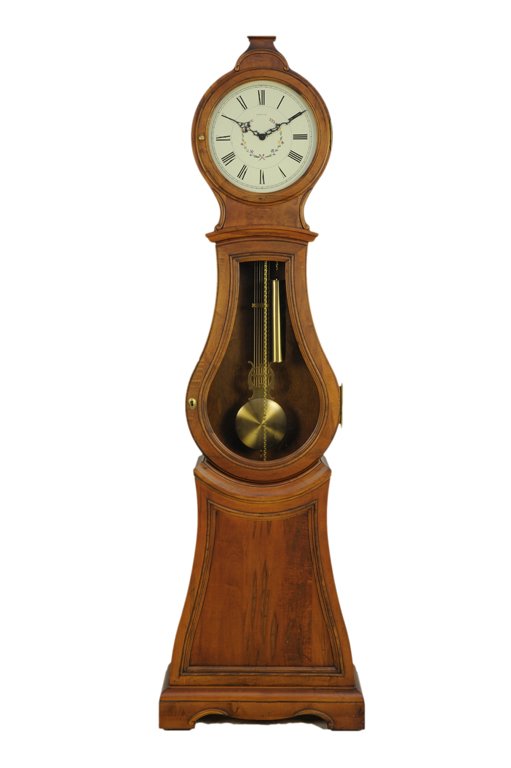 AN ETHAN ALLEN LONG CASE CLOCK WITH BRONZE PENDULUM: AN ETHAN ALLEN LONG CASE CLOCK WITH BRONZE PENDULUM 20th Century The clock features a round, white dial with roman numerals above a encased pendulum and chime with glass front on wood base with carved