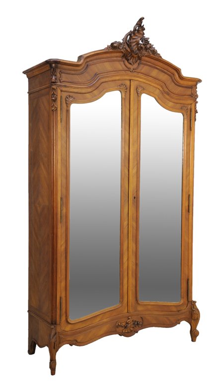 A LOUIS XV STYLE ARMOIRE WITH DIAMOND PARQUETRY: A LOUIS XV STYLE ARMOIRE WITH DIAMOND PARQUETRY An arched cornice is highlighted by carved, scrolling details above a conforming oak body with diamond parquetry bookmatched panels featuring interior s