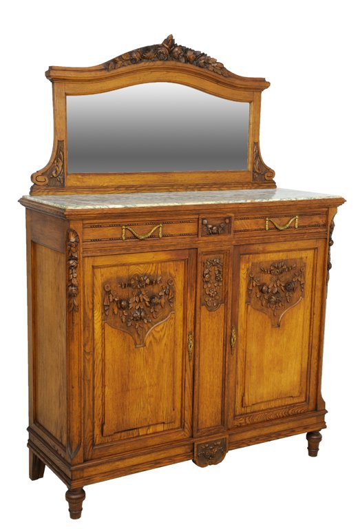 A LOUIS XV STYLE OAK SIDEBOARD: A LOUIS XV STYLE OAK SIDEBOARD 20th Century The white marble top with gray veins is supported by a conforming oak body with a stepped edge surmounting a frieze adorned with bronze swags and carved flo