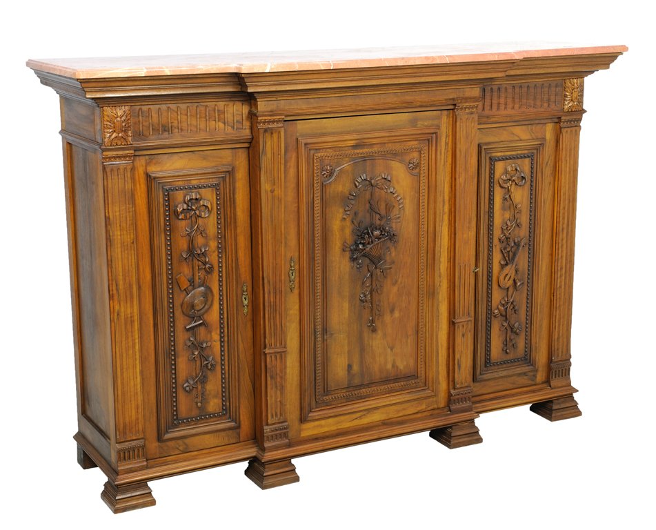 A LOUIS XVI STYLE THREE DOOR BUFFET: A LOUIS XVI STYLE THREE DOOR BUFFET Early 20th Century The shaped marble top is supported by a conforming, recessed body featuring a reeded frieze above carved reserves and locking cabinets with inter