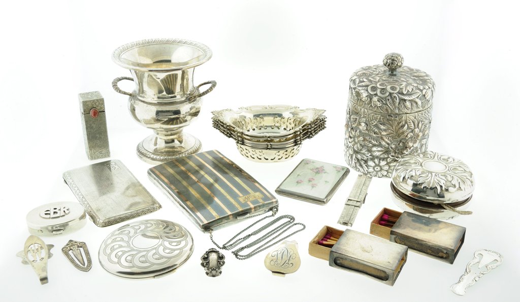A COLLECTION OF 50+ PIECES OF STERLING SILVER Late 19th: A COLLECTION OF 50+ PIECES OF STERLING SILVER Late 19th Century-Early 20th Century Consisting of ladies dressing items, dishes, and boxes; includes compact mirror, makeup case, matchbox, bookmark, tie