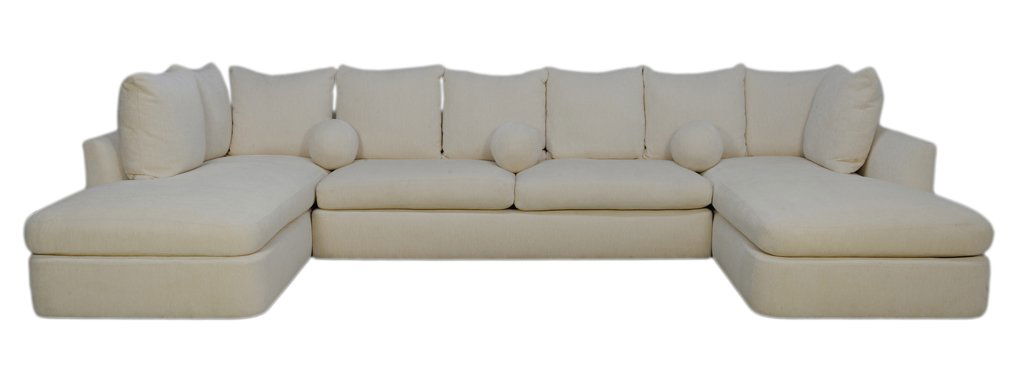 A KREISS MAMBO SECTIONAL SOFA 21st Century Very good co: A KREISS MAMBO SECTIONAL SOFA 21st Century The Mambo sectional features clean lines and generous seating with foam cushions wrapped in feather and down, that are expertly upholstered and rests upon a
