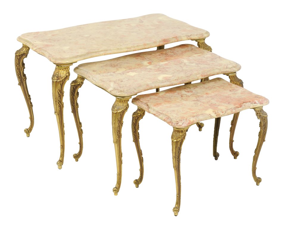 A SET OF THREE GRADUATED PINK MARBLE AND GILT BRONZE SI: A SET OF THREE GRADUATED PINK MARBLE AND GILT BRONZE NESTING TABLES 20th Century A trio of graduated pink marble top nesting tables feature gilt bronze finish cabriole legs, with scrolling foliate and