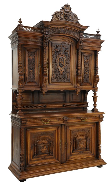 A RENAISSANCE REVIVAL STYLE BUFFET WITH DRAGON AND GARG: A RENAISSANCE REVIVAL STYLE BUFFET WITH DRAGON AND GARGOYLE Late 19th - Early 20th Century A Renaissance Revival Victorian style buffet with pierced gallery crown and gargoyle at center, having a thre