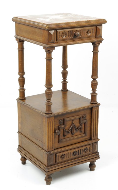 A NEOCLASSICAL STYLE WALNUT FINISH LAMP TABLE WITH SWAG: A NEOCLASSICAL STYLE WALNUT FINISH LAMP TABLE WITH SWAG Early 20th Century, France A Neoclassical style lamp table with a red marble top, turned columnar uprights, carved reed and rosette details, wit