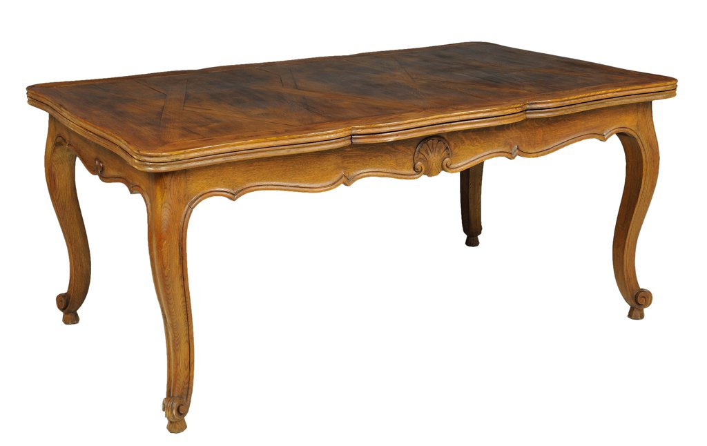 A LOUIS XV STYLE DRAW LEAF TABLE WITH BASKETWEAVE TOP: A LOUIS XV STYLE DRAW LEAF TABLE WITH BASKETWEAVE TOP Early 20th Century A Louis XV style table with basketweave top, a shaped edge, with scalloped apron and center carved shell, is raised on cabriole