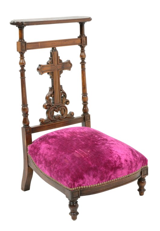 AN ANTIQUE FRENCH VICTORIAN PRIE DIEU PRAYER CHAIR WITH: AN ANTIQUE FRENCH VICTORIAN PRIE DIEU PRAYER CHAIR WITH CROSS Early 20th Century An open splat back featuring a cross flanked by turned uprights surmounting an upholstered, padded knee rest with nailh