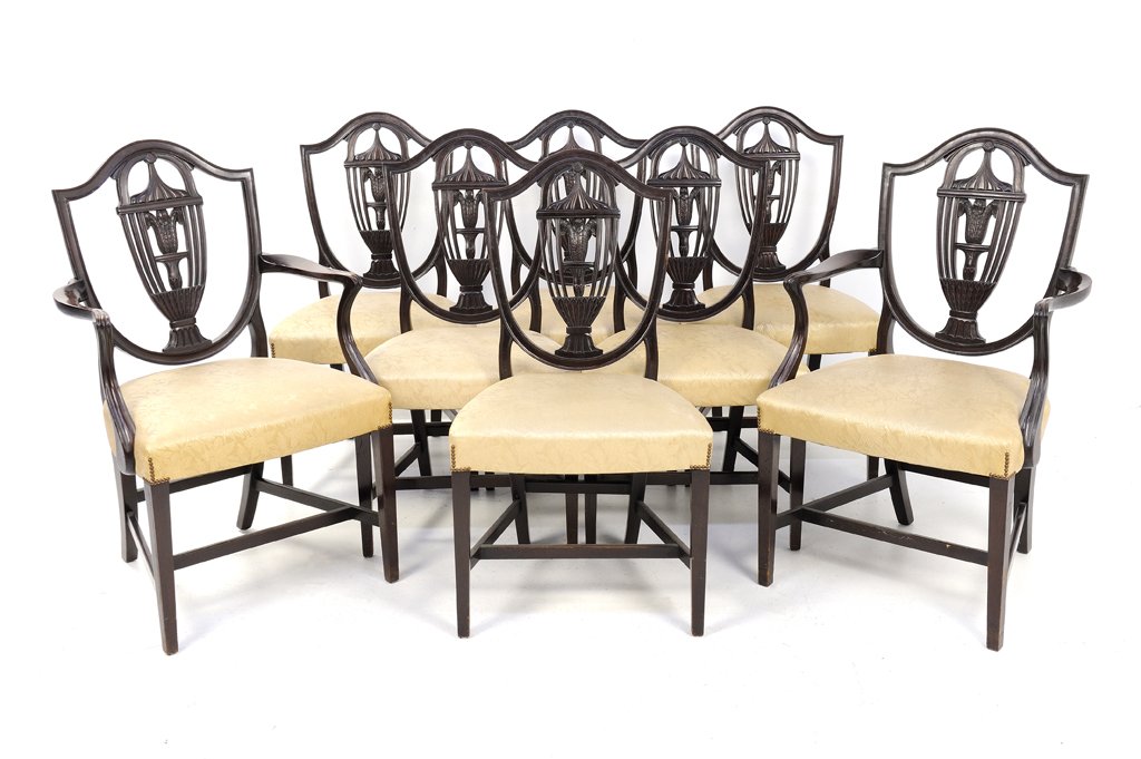 A SET OF EIGHT HEPPLEWHITE SHIELD STYLE CHAIRS: A SET OF EIGHT HEPPLEWHITE SHIELD STYLE CHAIRS 20th Century A set of eight Hepplewhite shield style chairs includes six side chairs and two armchairs with creme covered seat. In very good condition. E